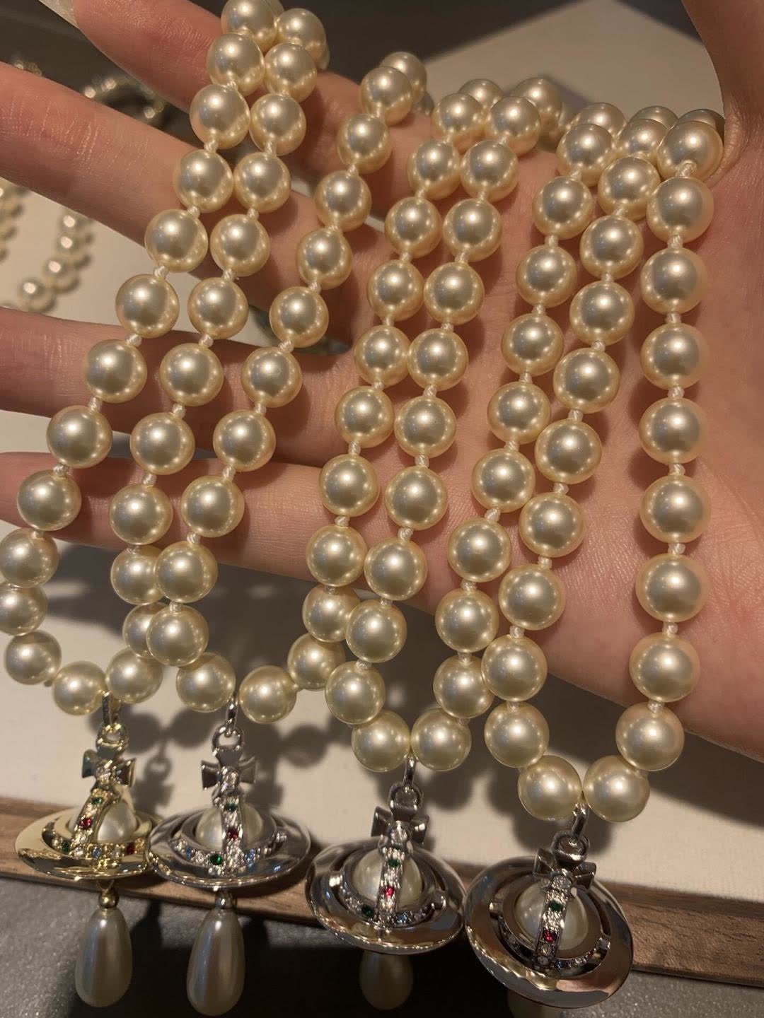 Vivienne Westwood Elegant Pearl Necklace with Pendant